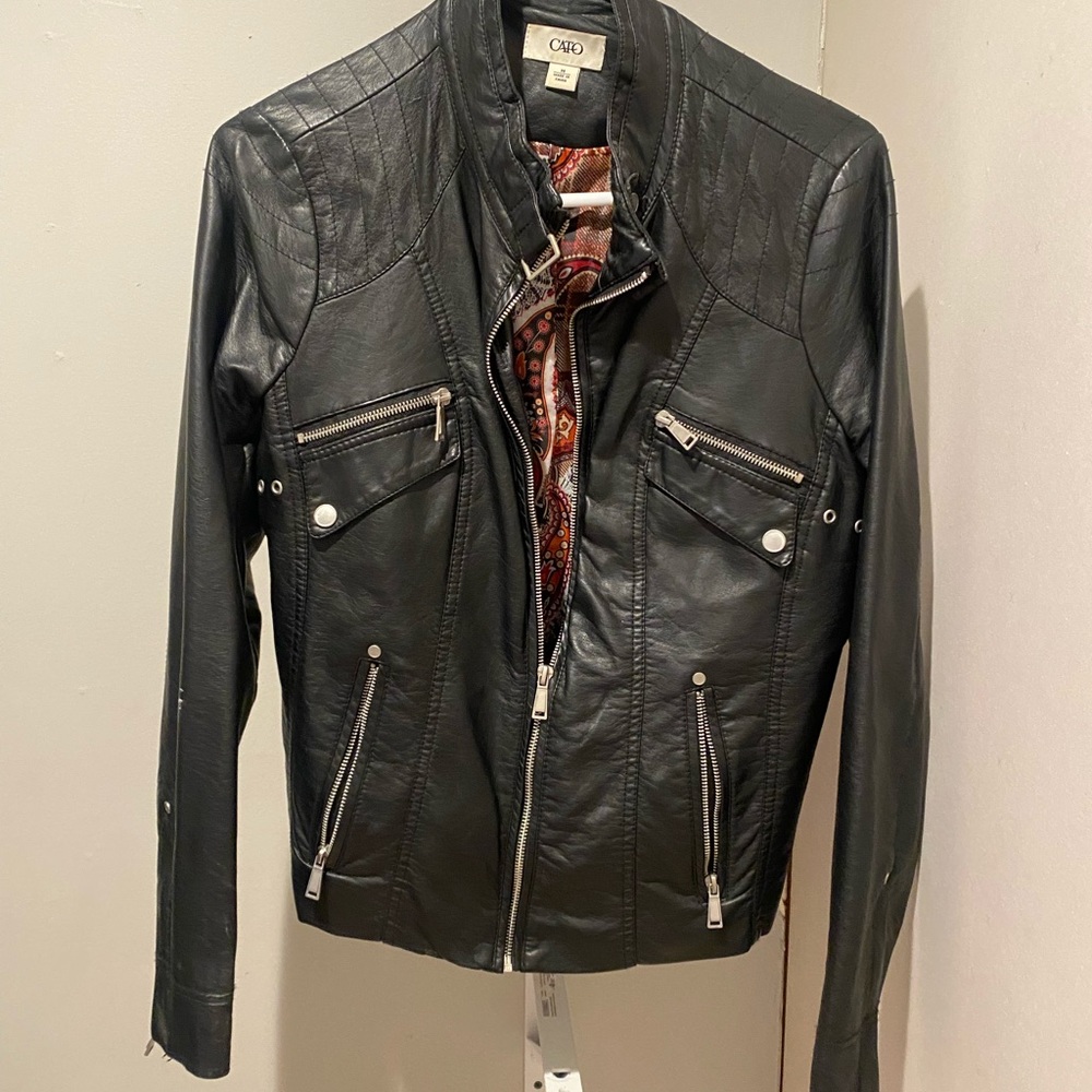 Moto faux leather jacket with printed liner.  Very comfortable & a great jacket!